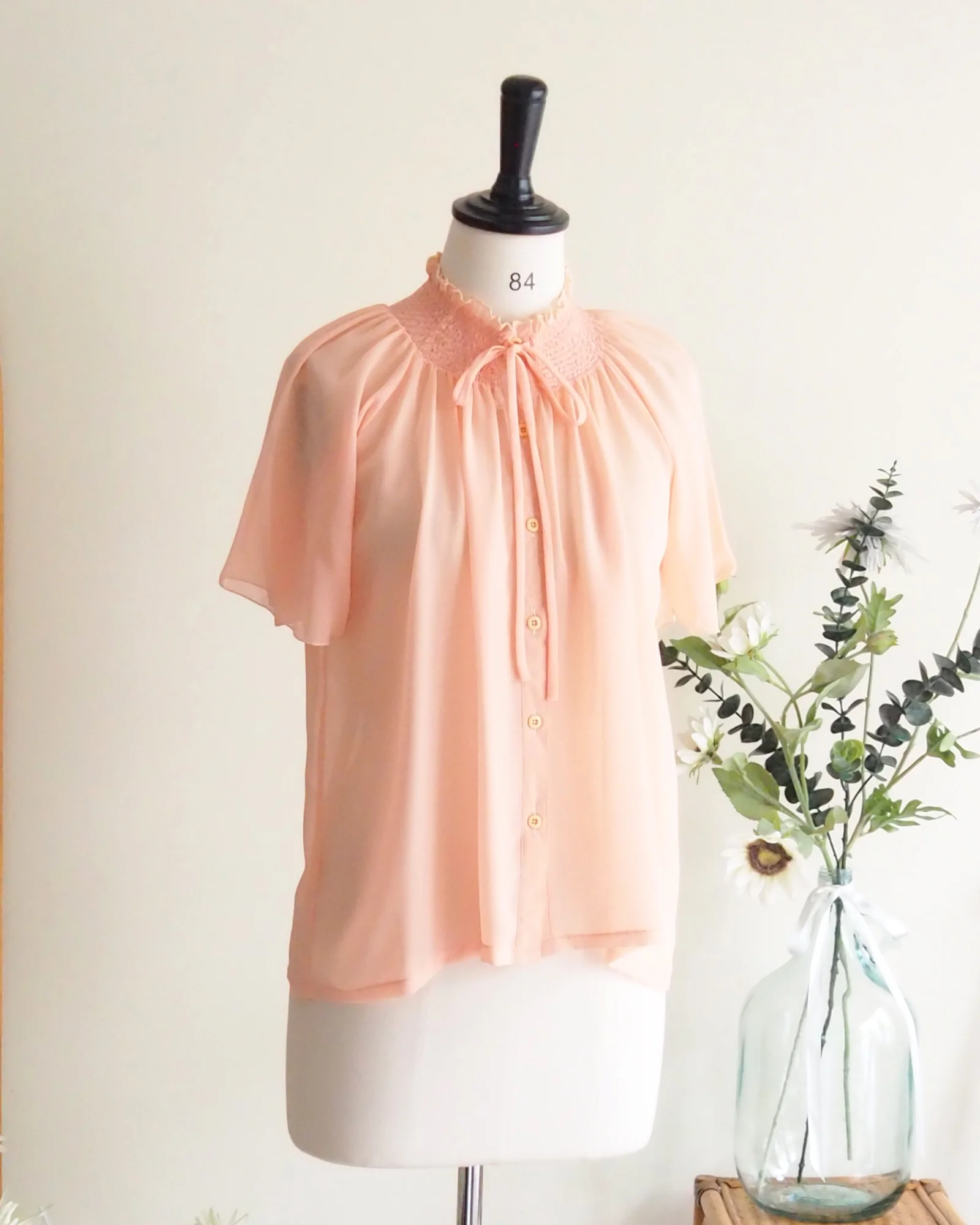เสื้อวินเทจ สีส้มโอรส โทนสว่าง สดใส รอบคอสม็อค